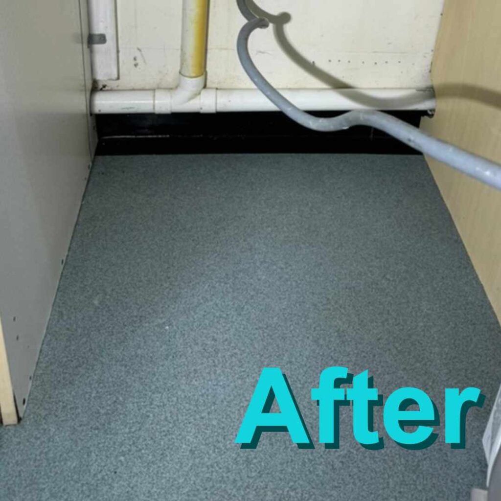 Under the washing machine the floor has been left spotless and like new
